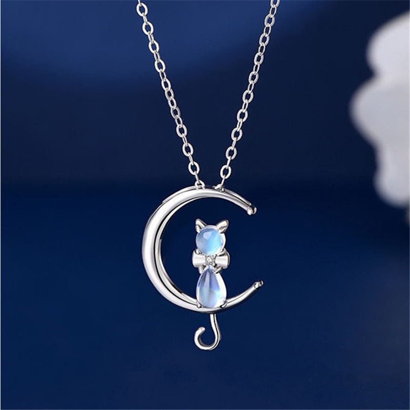 Necklace with moonstone in the shape of a crescent moon and cat